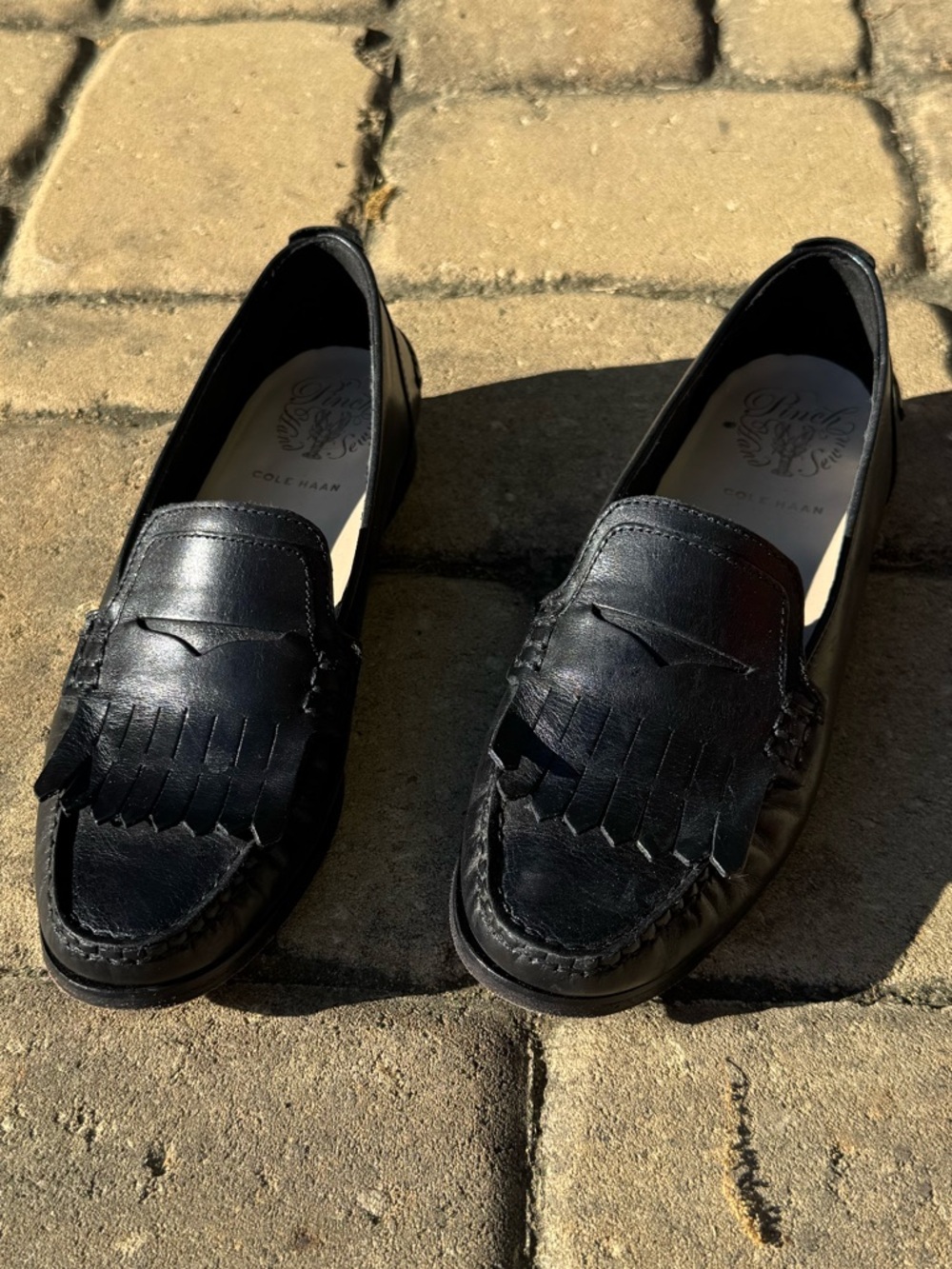 Cole Haan Black Leather Kiltie Penny Loafers
